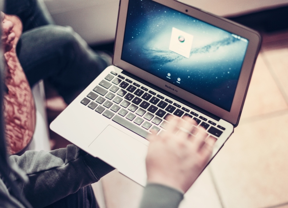 typing on laptop